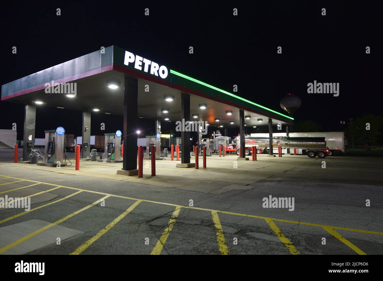 Night time photo of the gas pumps at the Petro Truck Stop in Monee