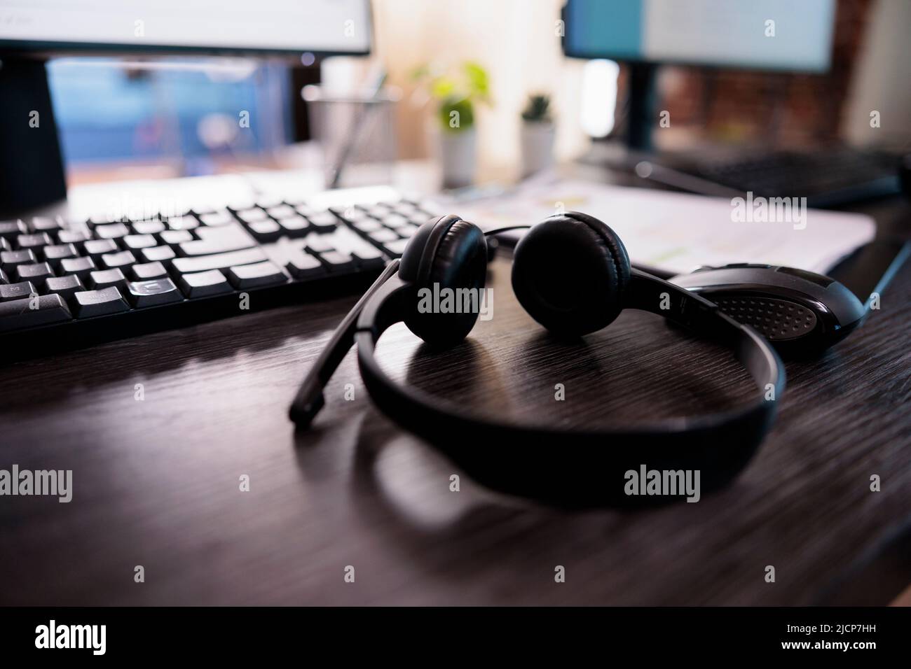 Telemarketing client service equipment on helpdesk in office, telework headset with microphone