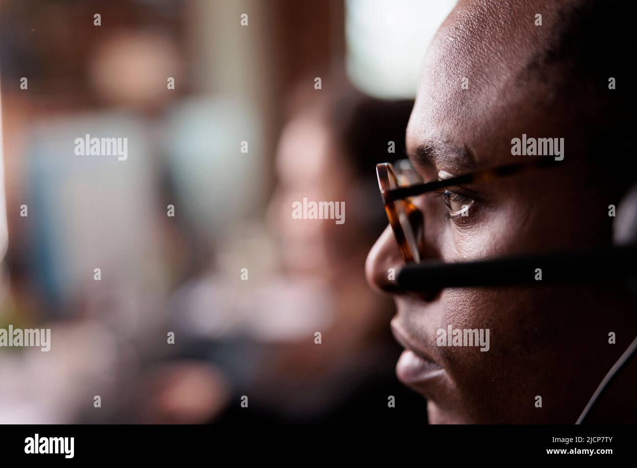 Call centre operator using telephone hi-res stock photography and ...