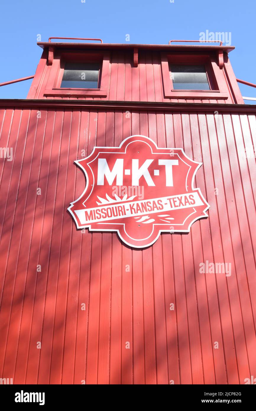 A Missouri Kansas Texas (MKT) red caboose displayed at the Farmers Branch Historical Park Stock Photo