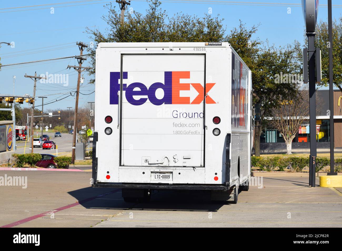 Rear view of a parked FedEx delivery truck Stock Photo