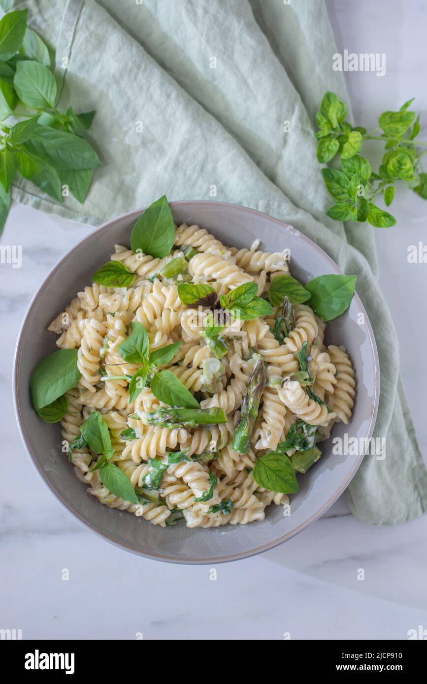 spring pasta with asparagus and wild garlic Stock Photo