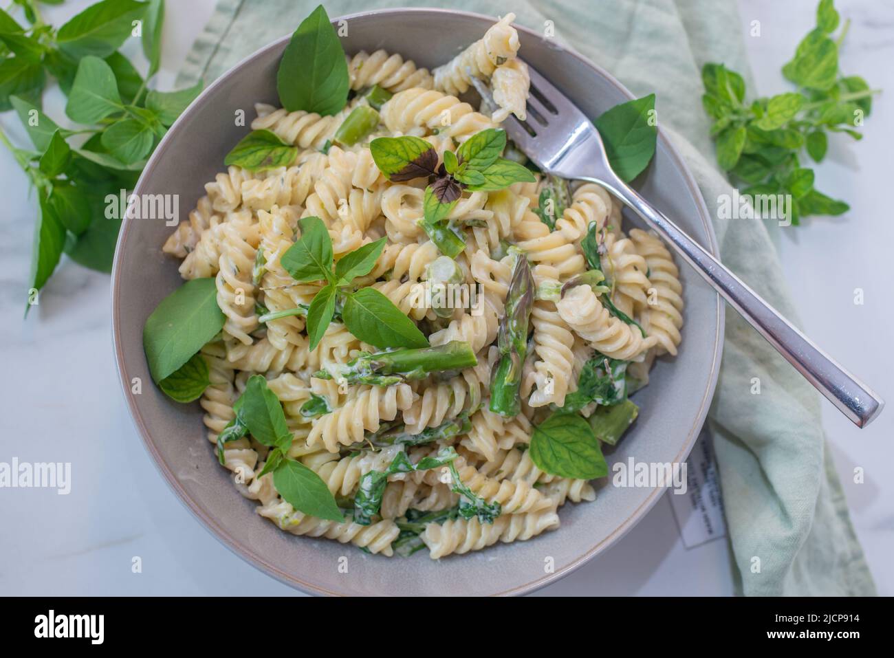 spring pasta with asparagus and wild garlic Stock Photo