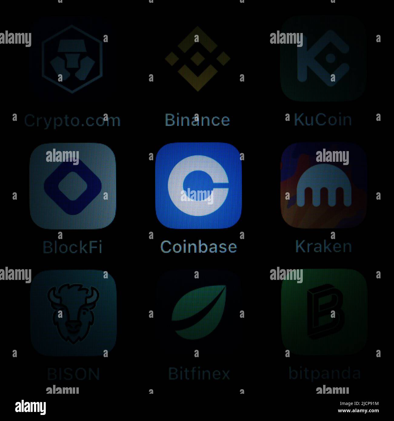 Rottweil, Germany. 15th June, 2022. The application apps of cryptocurrency  exchanges Crypto.com, Binance, KuCoin, BlockFi, Coinbase, Kraken, Bison,  Bitfinex and Bitpanda are seen on the display of an iPhone SE. Employees are