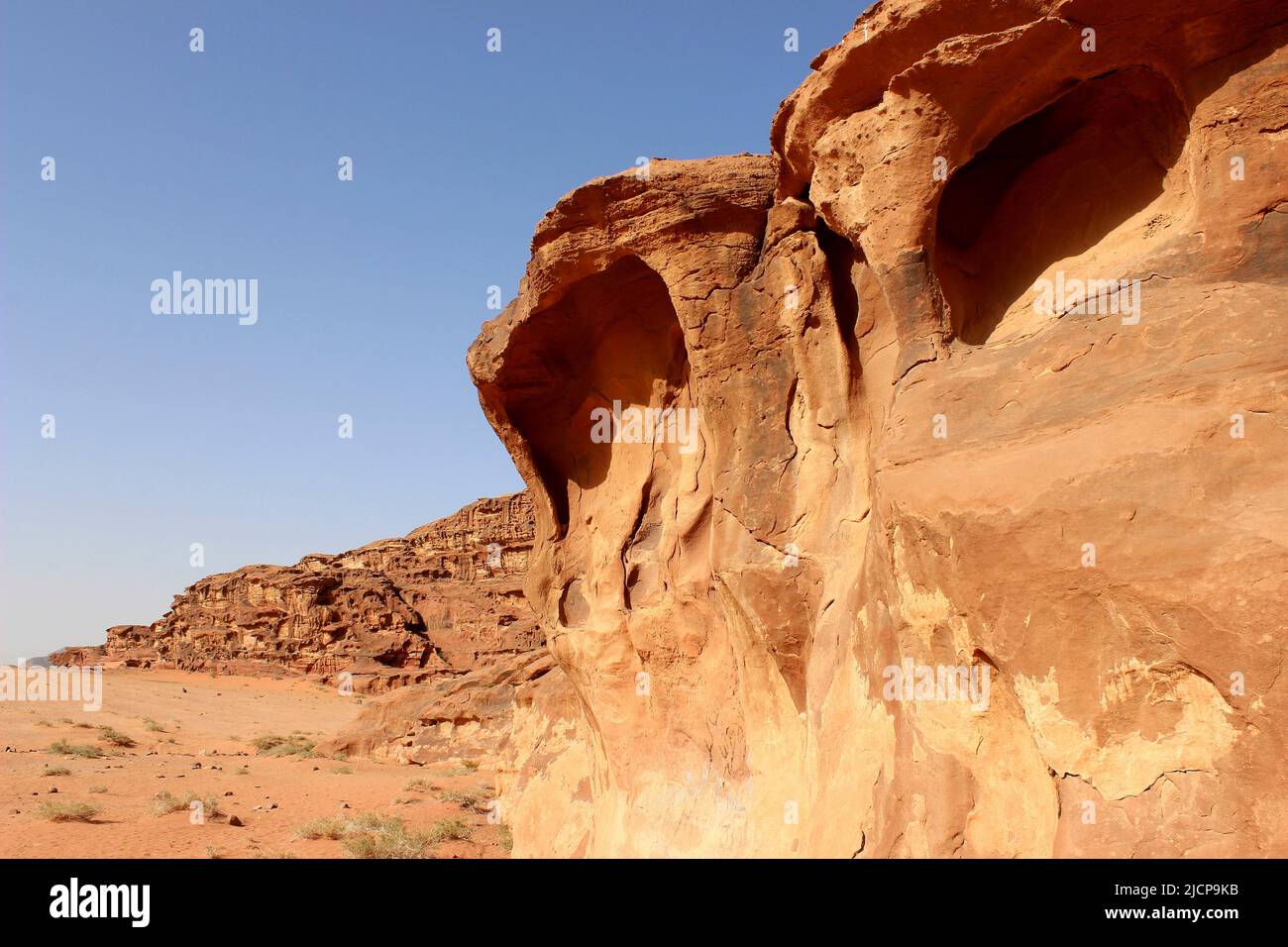 Um Sahn Sandstone Rock Escarpment in Wadi Rum, Jordan Stock Photo