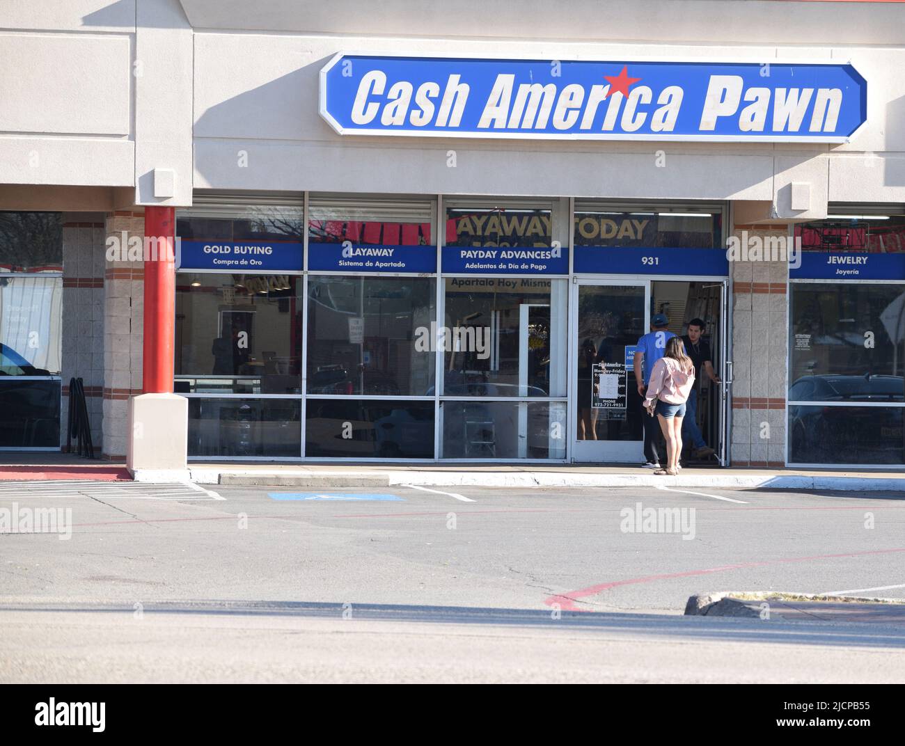 Customers being welcomed into a Cash America Pawn shop in Irving, Texas Stock Photo