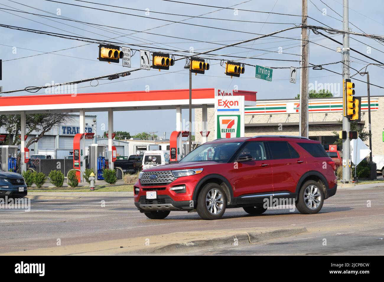 SUV turning left onto Irving Blvd. in Dallas Texas with a 711