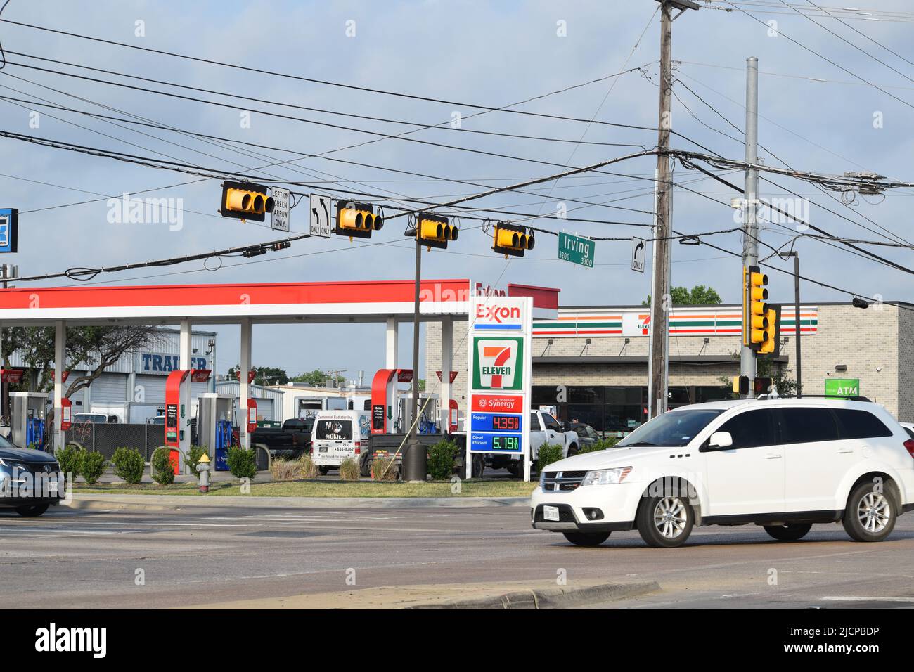 SUV turning left onto Irving Blvd. in Dallas Texas with a 711