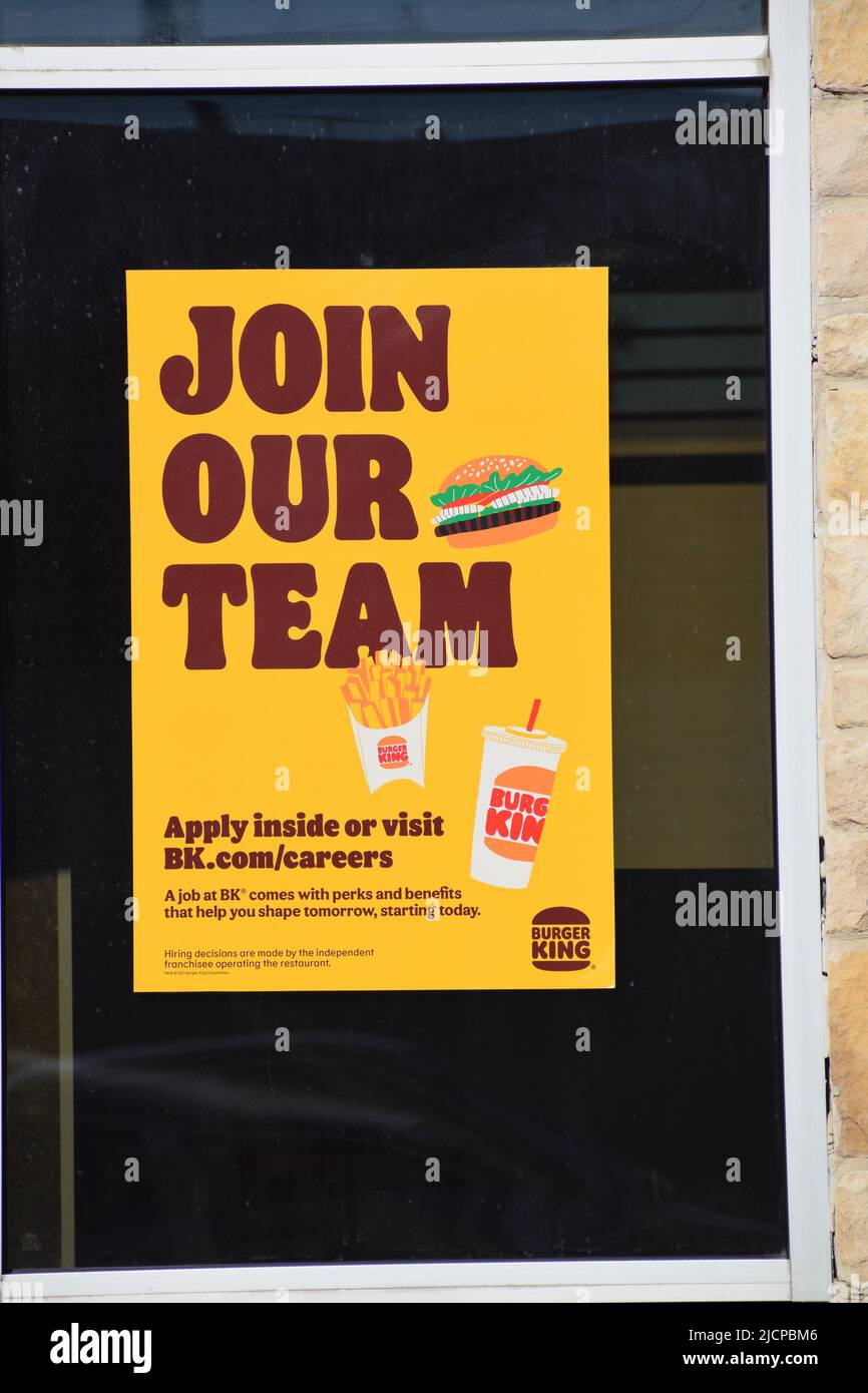 A Join Our Team / now hiring sign for a Burger King restaurant Stock