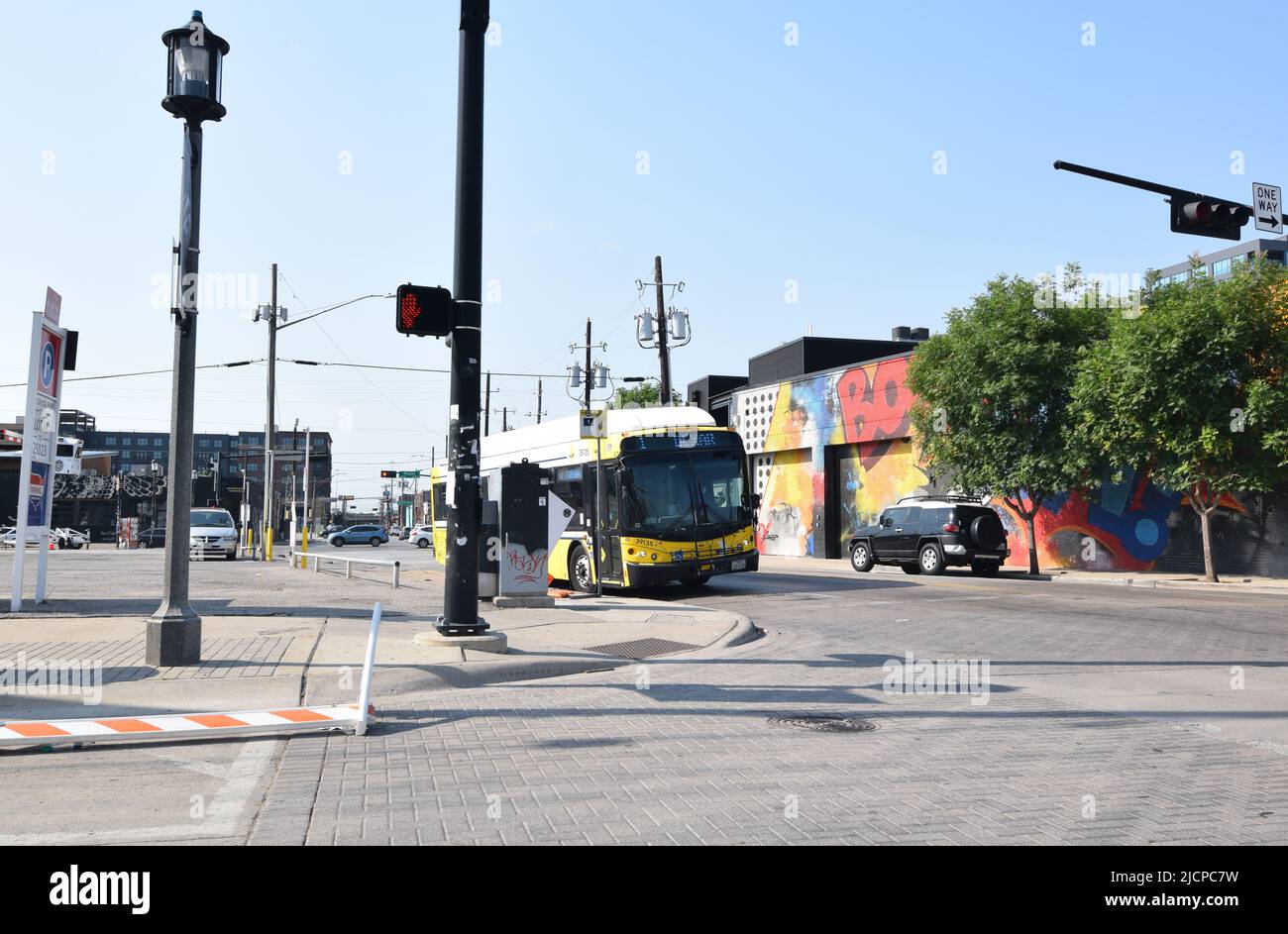 DART (Dallas Area Rapid Transit) Bus at a bus stop in the Deep Ellum area of Dallas Texas Stock Photo