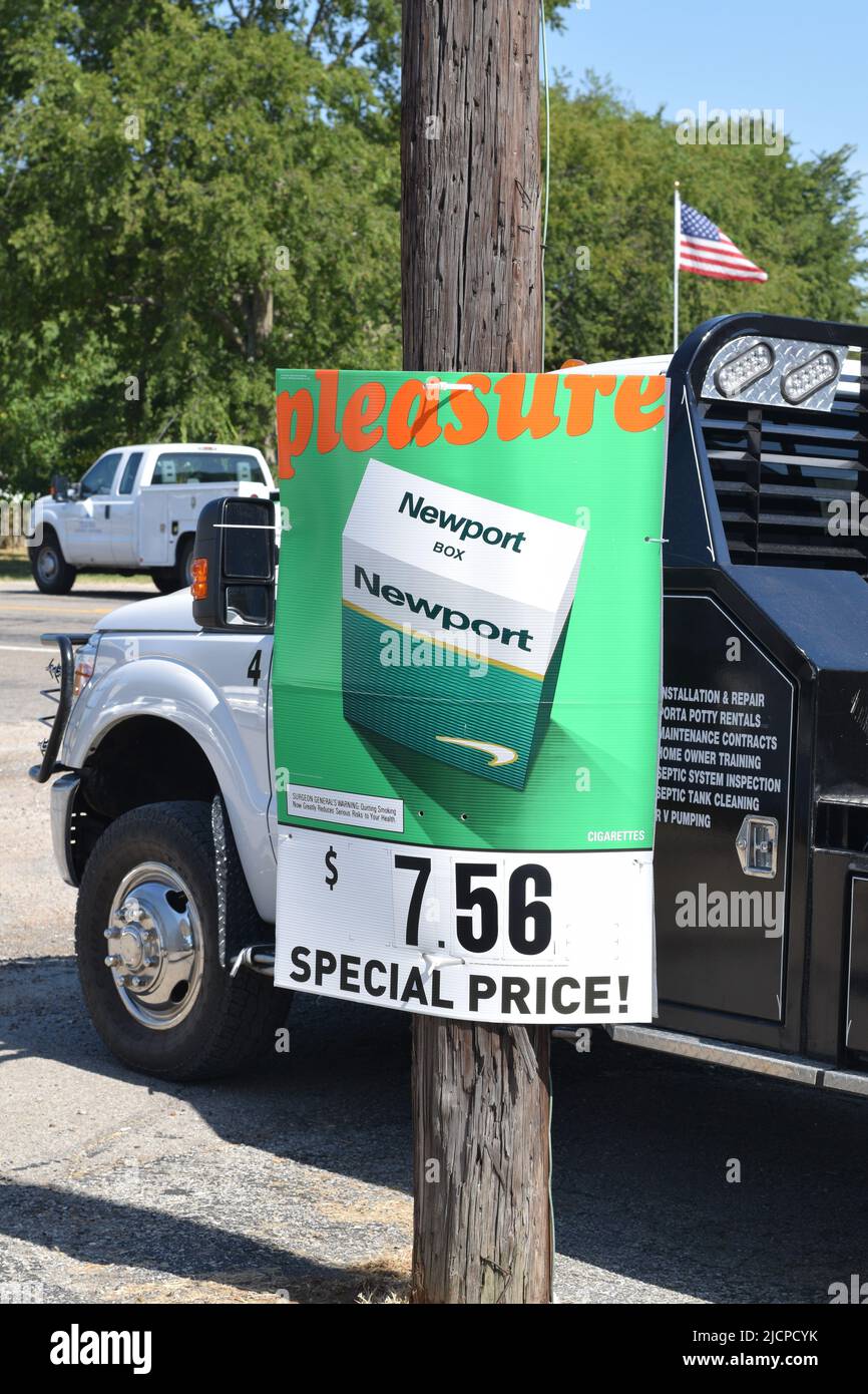 Newport Cigarettes advertisment stapled to a utility pole Stock Photo