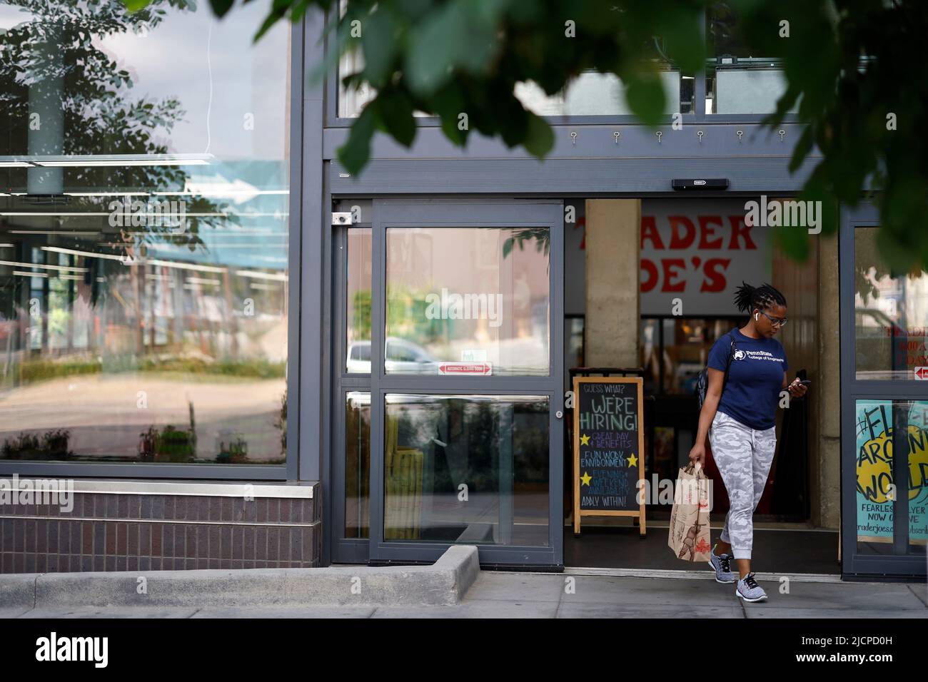 Washington, DC, USA. 14th June, 2022. A woman walks out of a supermarket in Washington, DC, the United States, on June 14, 2022. The U.S. Labor Department reported on Tuesday that producer prices surged 10.8 percent year on year in May, the latest sign of mounting inflation pressure, which could prompt the Federal Reserve to raise rates more aggressively. Credit: Ting Shen/Xinhua/Alamy Live News Stock Photo