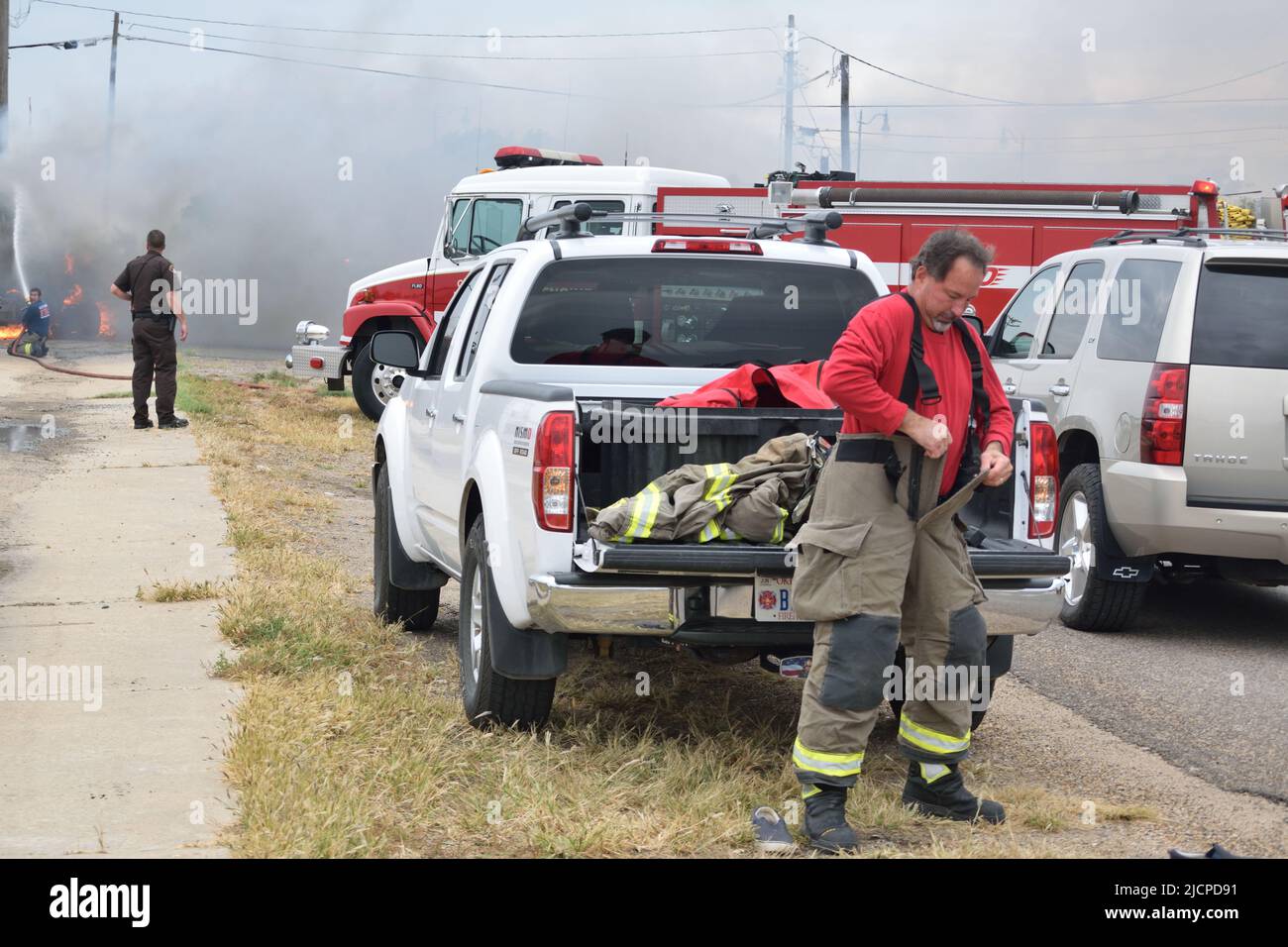 Firefighters fighting a fire in Guymon, Oklahoma Stock Photo