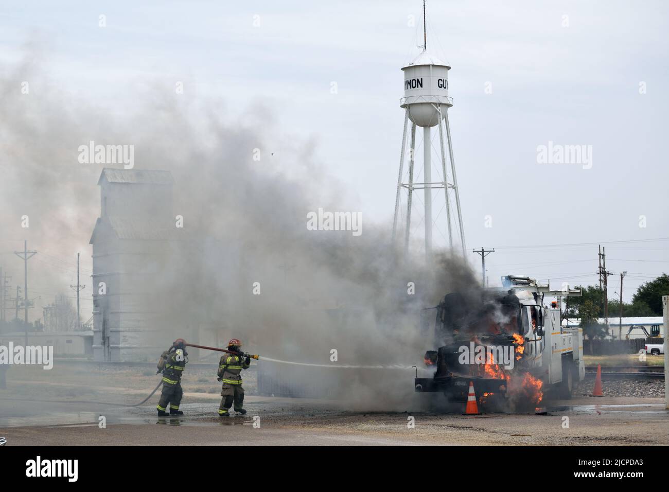Firefighters fighting a fire in Guymon, Oklahoma Stock Photo