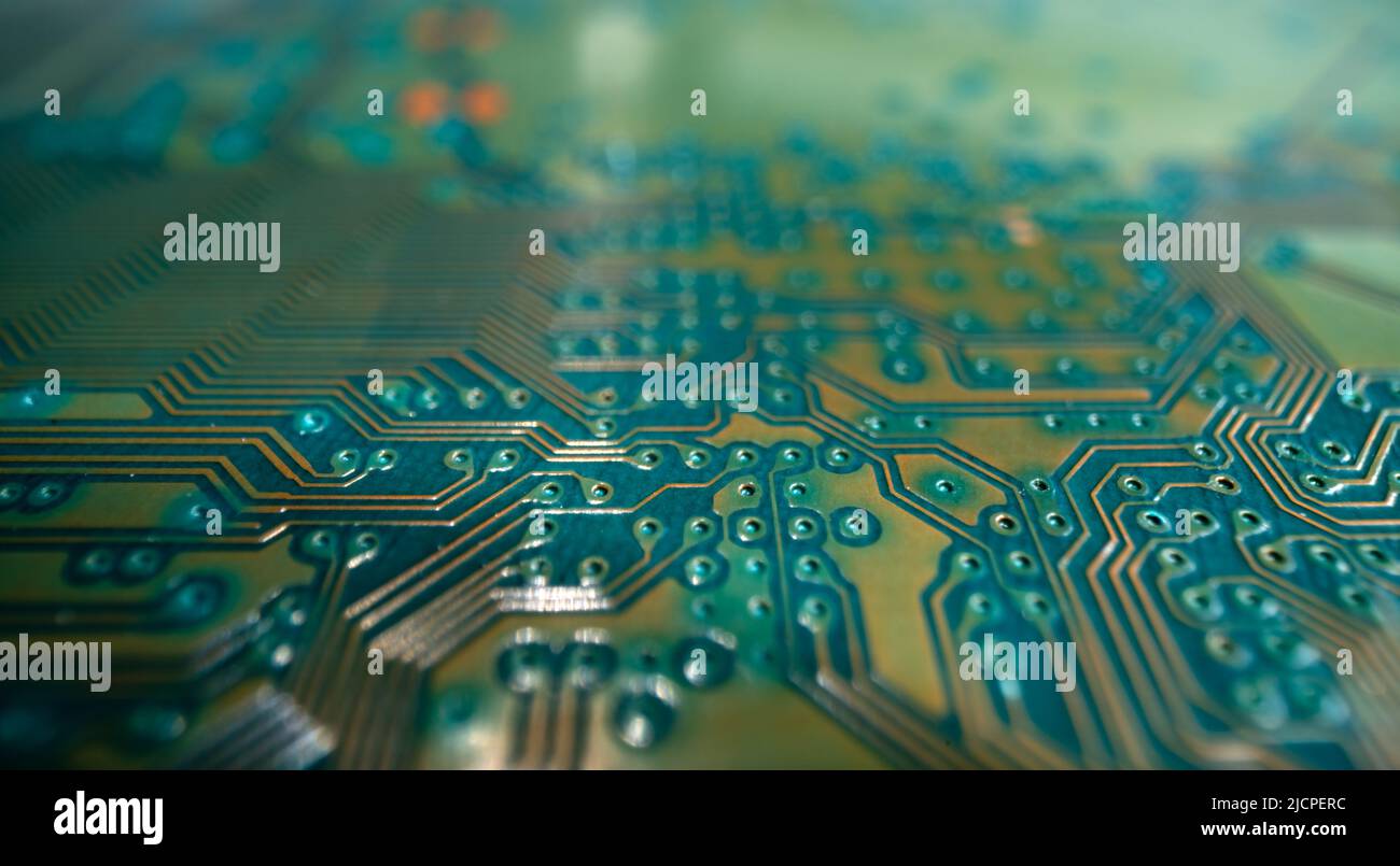 Technology background with circuit board. Electronic computer hardware technology. Motherboard digital chip. Tech science texture. Stock Photo