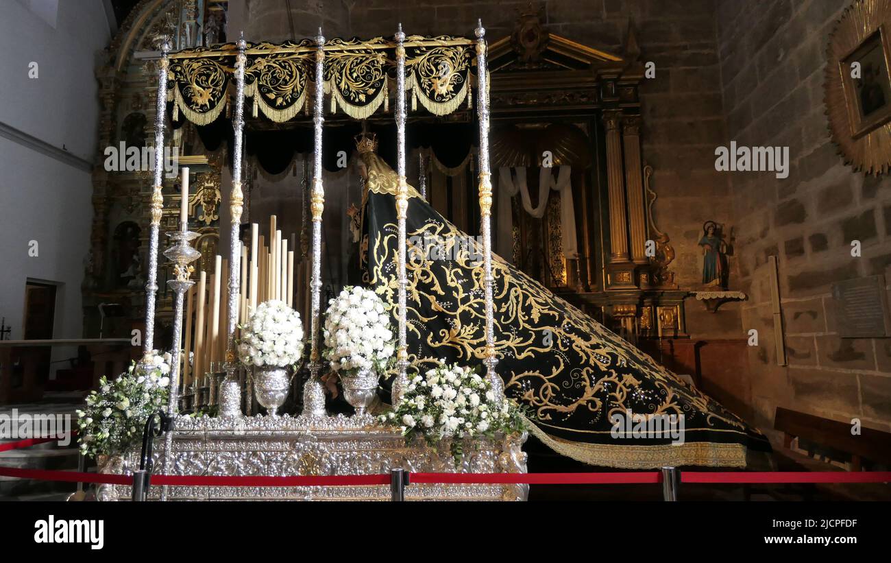 Alora, Spain - April 2, 2021: Religious figures on display in parish church on Good Friday Stock Photo