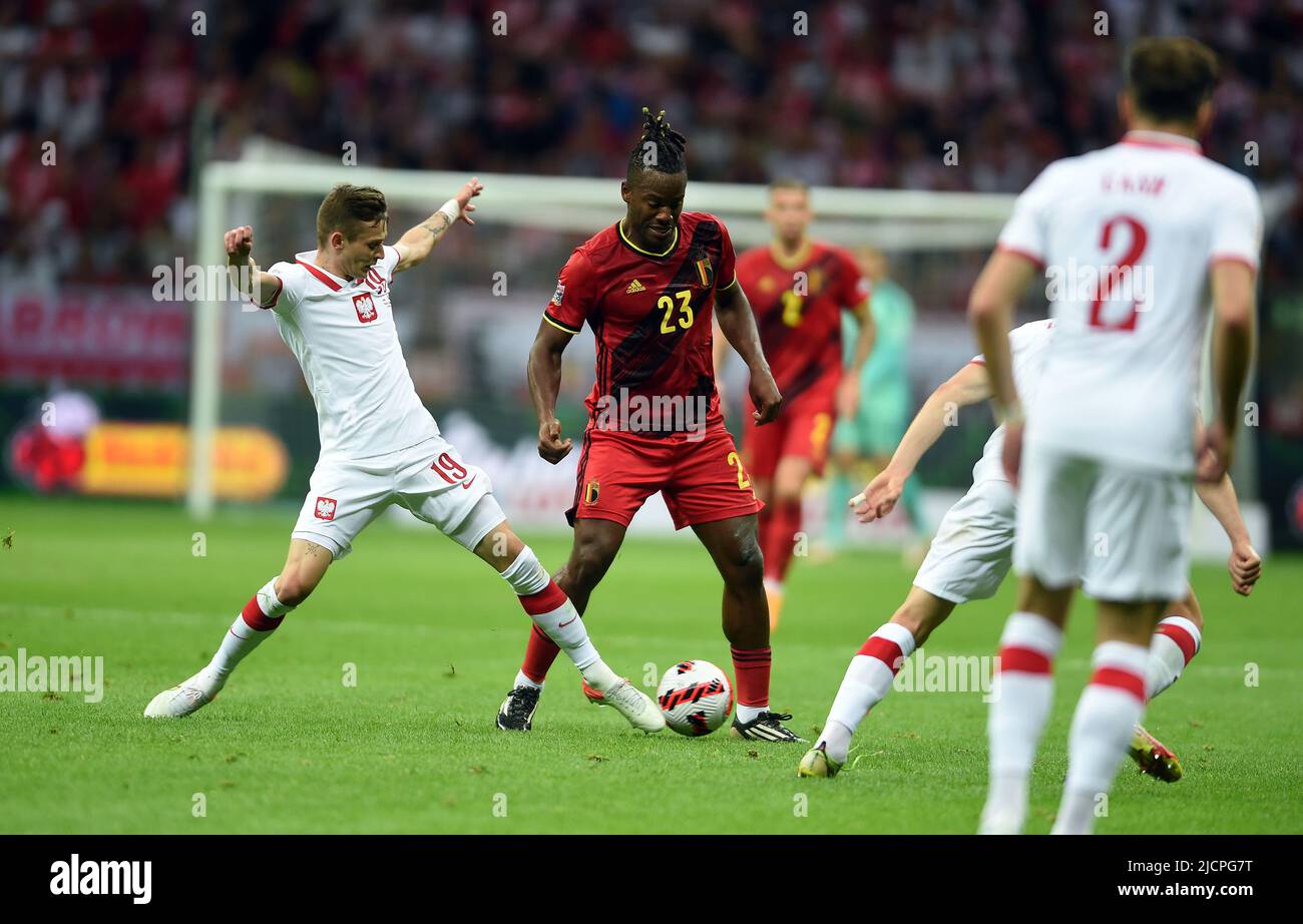 WARSAW, POLAND - JUNE 14, 2022: UEFA Nations League 2023 Poland - Belgium game o/p: Sebastian Szymanski (Poland) Michy Batshuayi (Belgium) Stock Photo