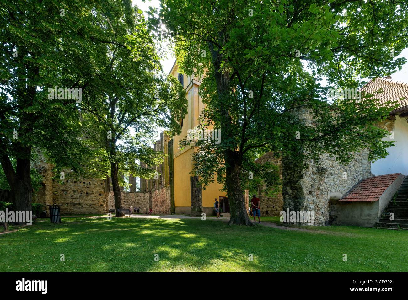 The unbuilt Monastery Church of the Virgin Mary is an unfinished Gothic building with a completed Baroque bell tower in Panensky Tynec - Stock Image