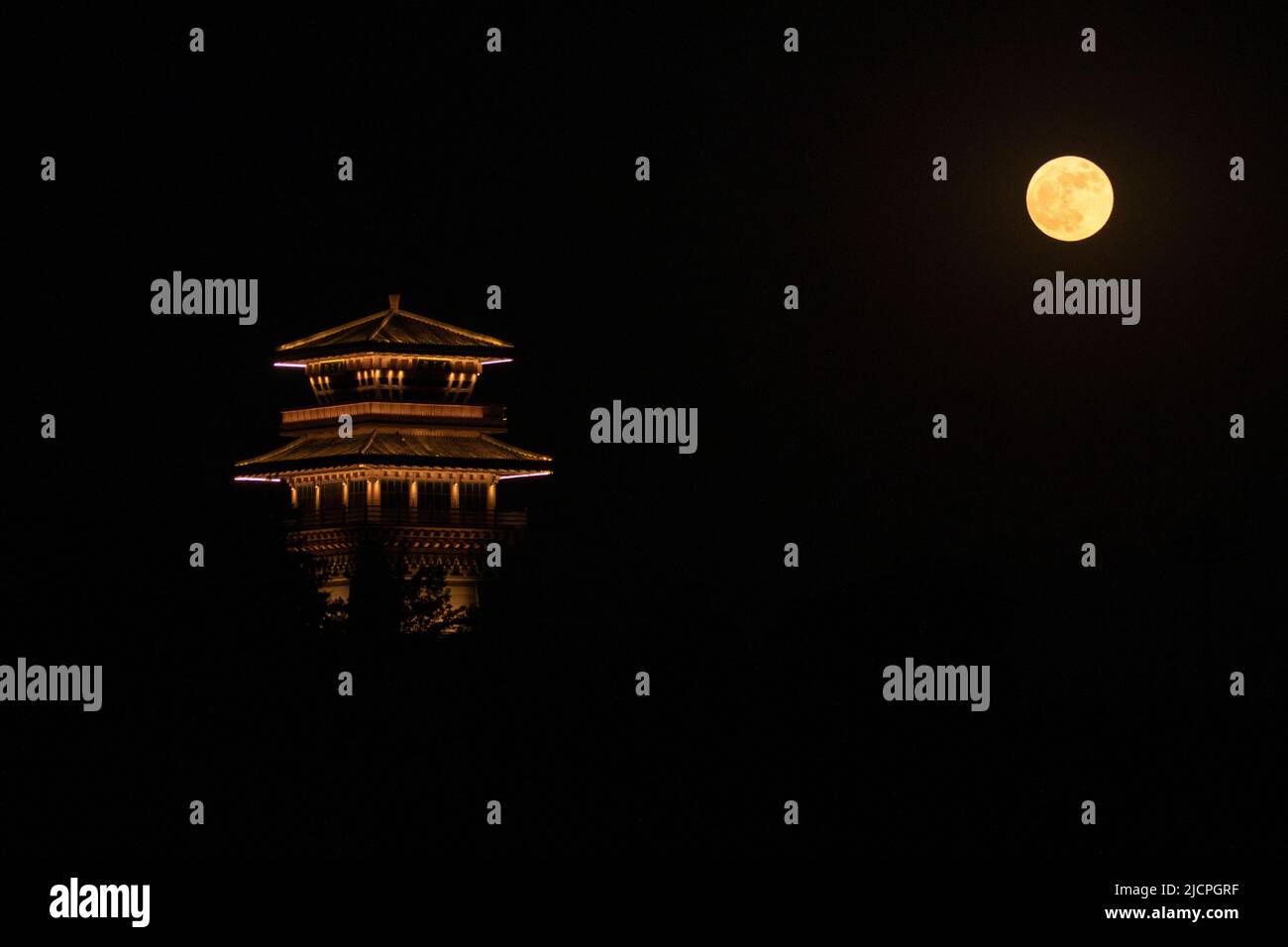 Beijing, China's Henan Province. 14th June, 2022. A supermoon is pictured in Baofeng County of Pingdingshan, central China's Henan Province, June 14, 2022. Credit: He Wuchang/Xinhua/Alamy Live News Stock Photo