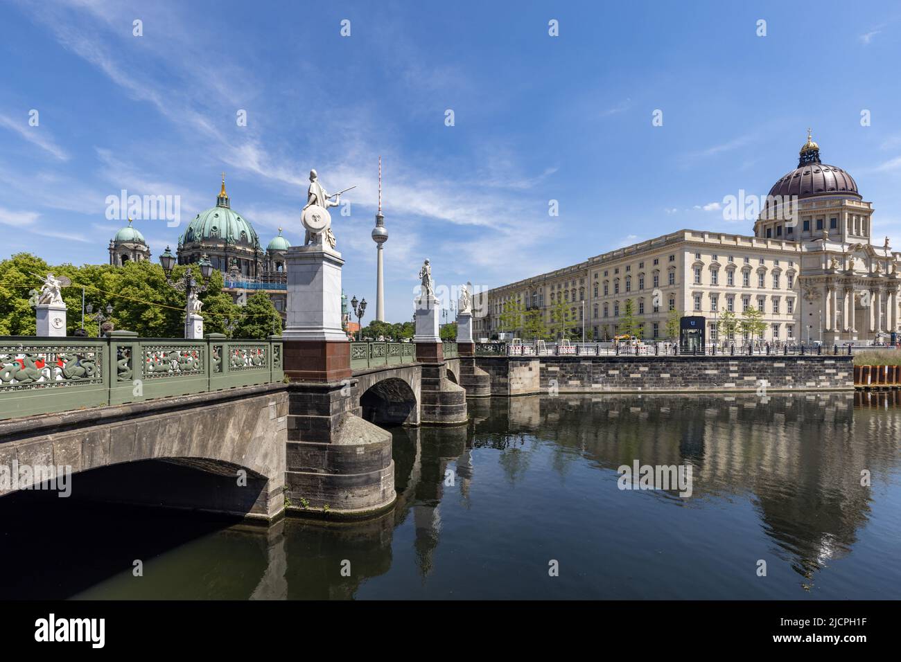 The Schloss Bridge over the Spree canal, with the Berliner Dom Cathedral on the left and the rebuilt Berlin City Palace on the right, Berlin. Stock Photo