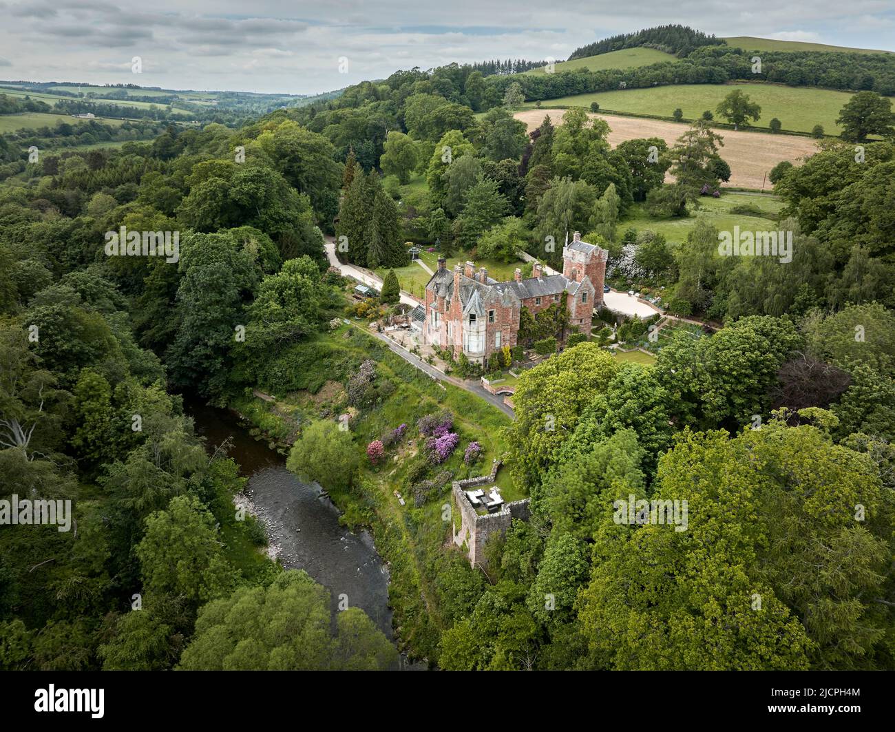 Aerial view of Cowdenknowes estate, in Earlston with the River Leader in the foreground. Stock Photo