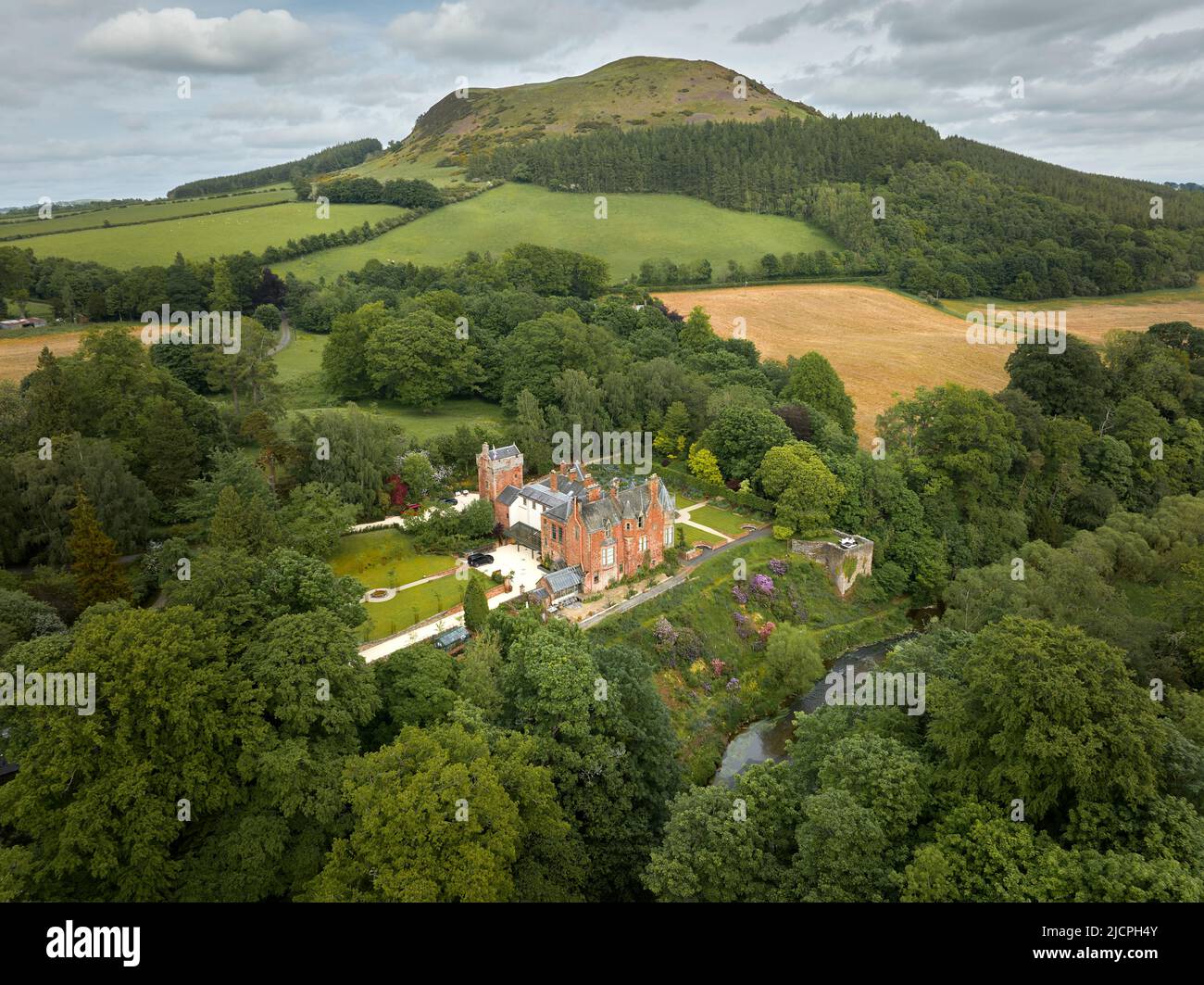 Aerial view of Cowdenknowes estate, in Earlston with the Black Hill in the distance and the