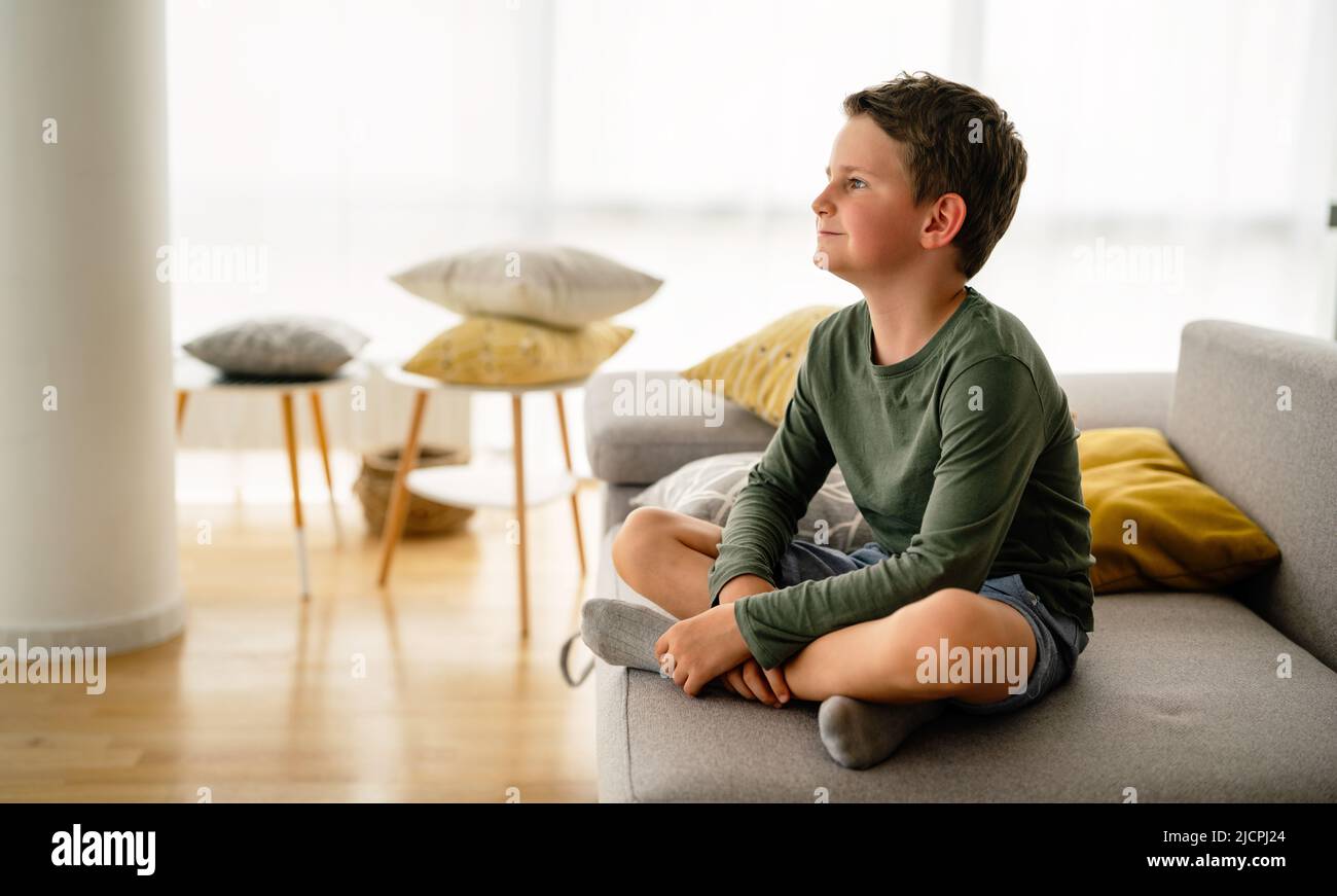 Happy cute little boy at new modern home Stock Photo - Alamy
