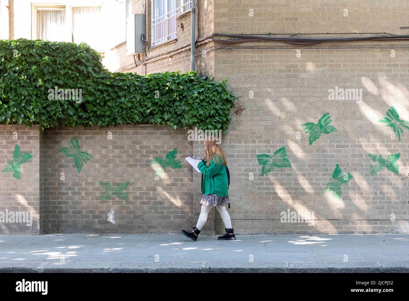 A memorial service is held at Grenfell Tower to commemorate the 5th