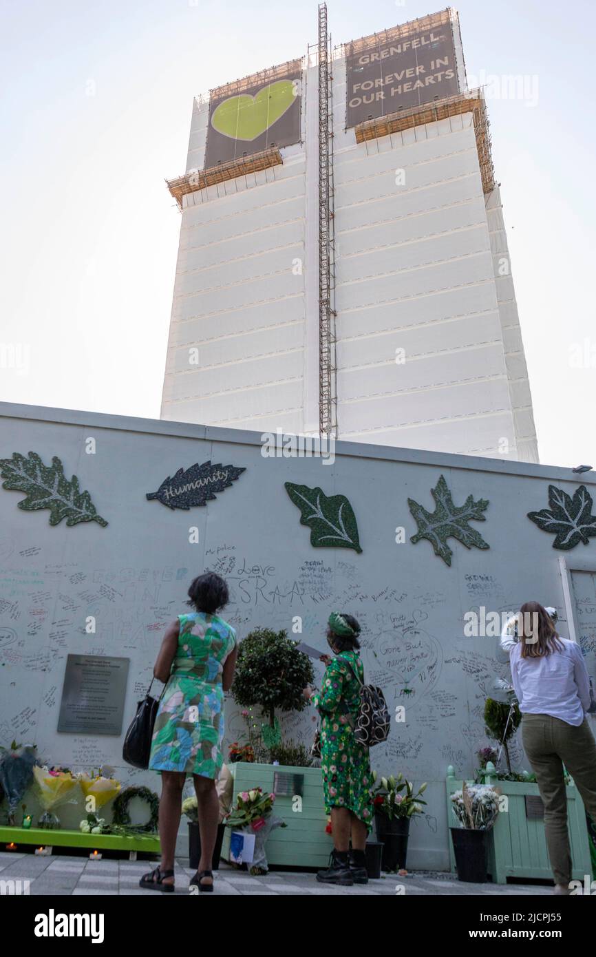 A memorial service is held at Grenfell Tower to commemorate the 5th