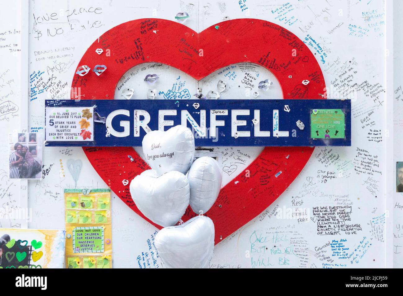 A memorial service is held at Grenfell Tower to commemorate the 5th