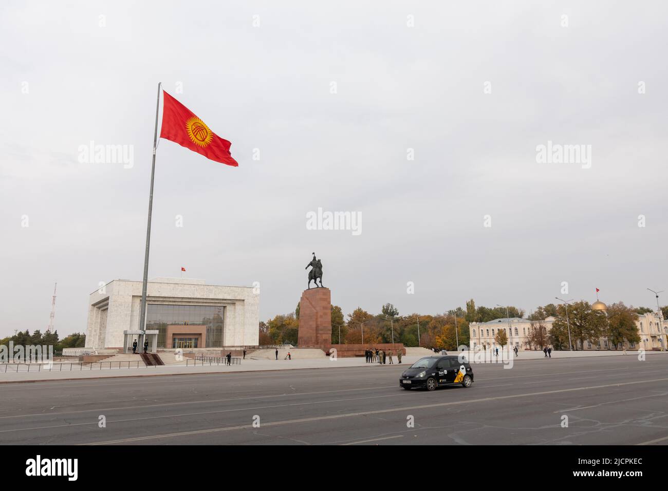 Bishkek, Kyrgyzstan - October 21, 2021: Bishkek city central square with Kyrgyzstan national flag. The capital city of Kyrgyz Republic Stock Photo