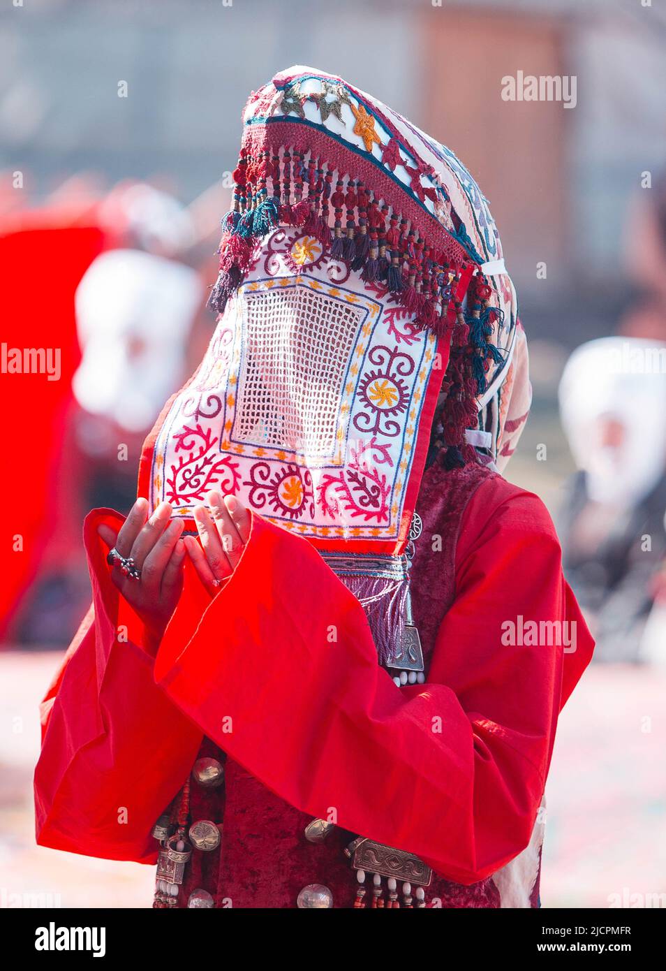 Kyrgyz woman in national dress during World Nomad Games Stock Photo