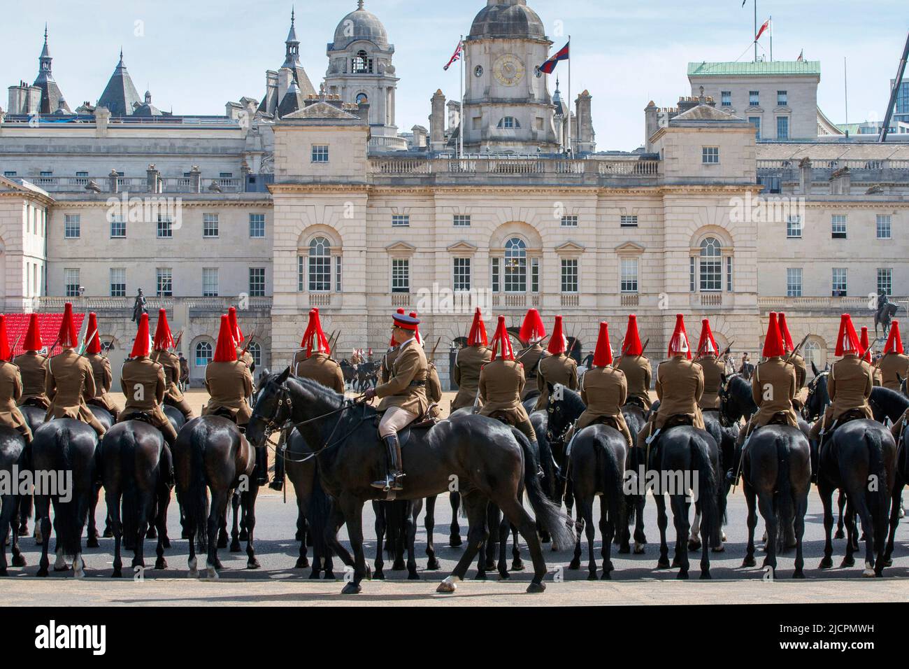 Queens Household Cavalry riding horses on Horseguards Parade rehearsing for Trooping the Colour in London, England, United Kingdom Stock Photo