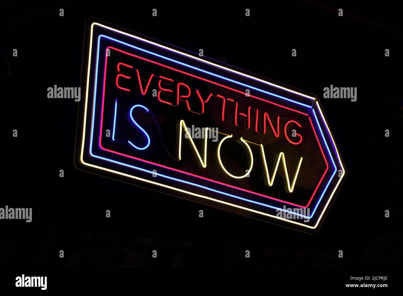 'Everything is now' neon sign Stock Photo