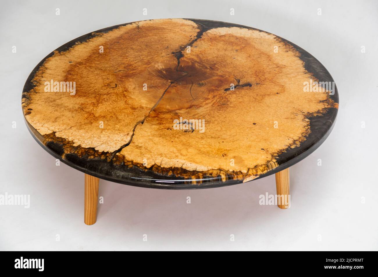 Epoxy resin round table on a white background Stock Photo Alamy