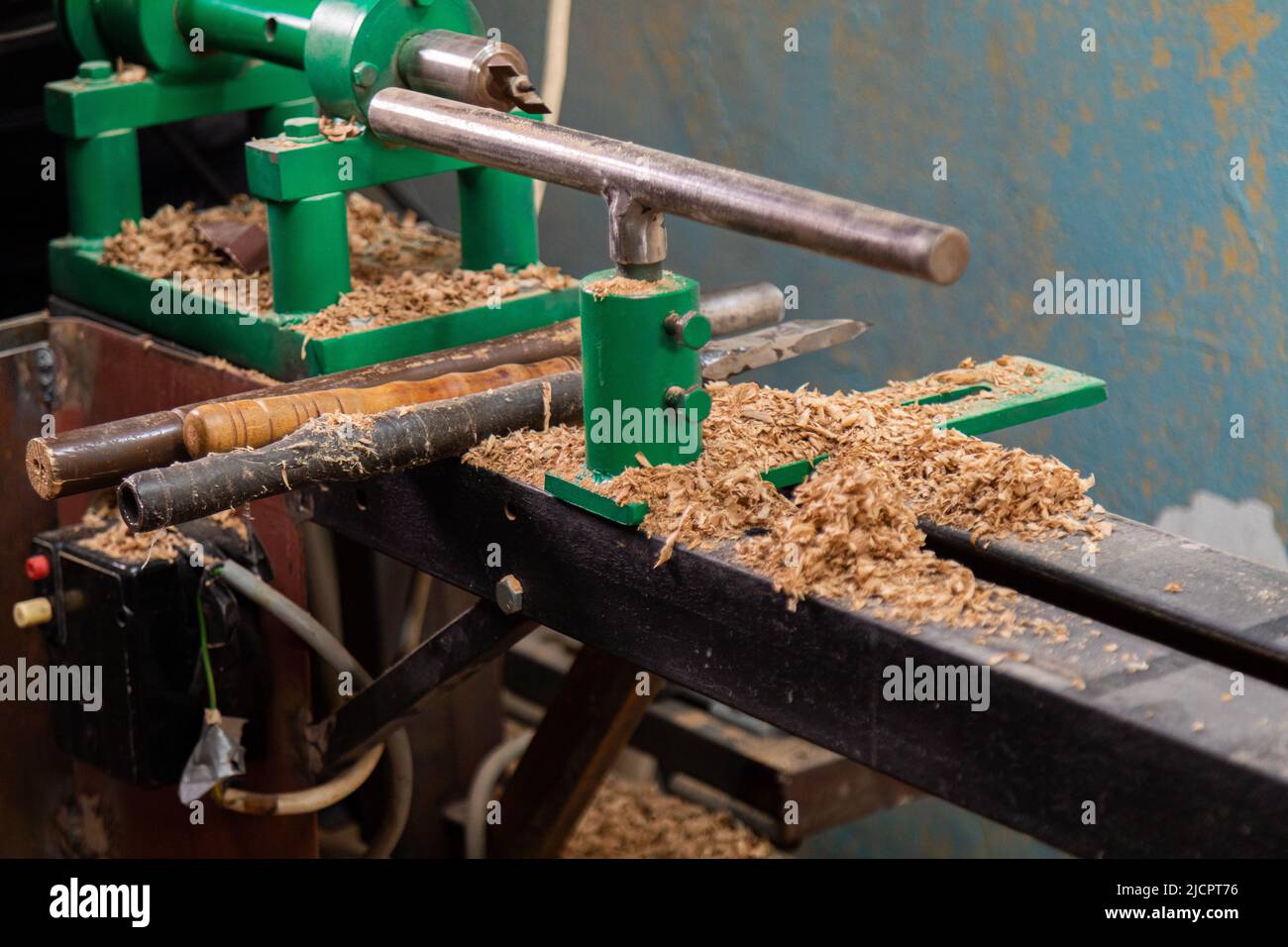 Lathe machine with wooden turning blanks in Stock Photo Alamy
