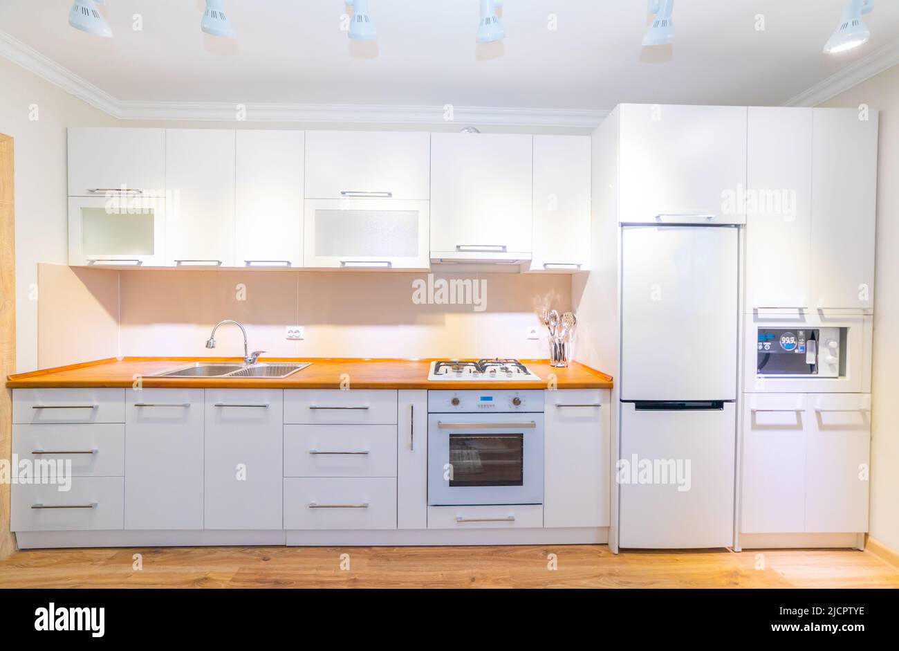 Modern kitchen interior with electric and microwave oven Stock Photo