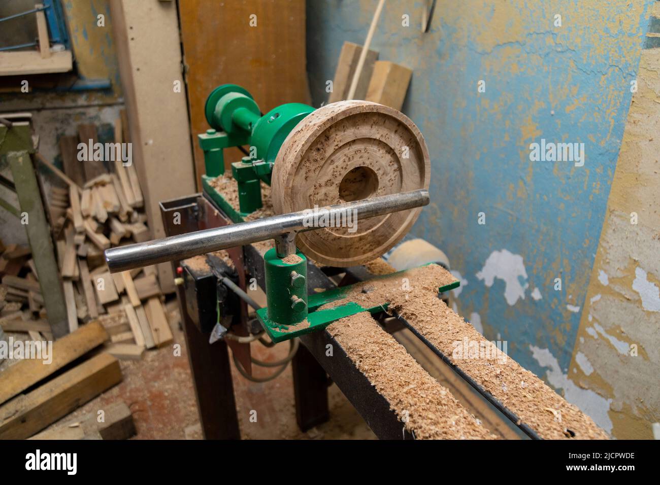 Lathe machine with wooden turning blanks in Stock Photo Alamy