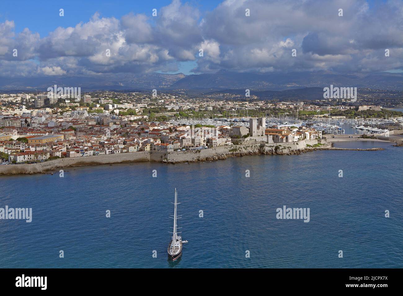 France, Alpes-Maritimes, Antibes, seaside town and fortified town of Antibes, seen from the sea, with boats, (aerial photo) Stock Photo