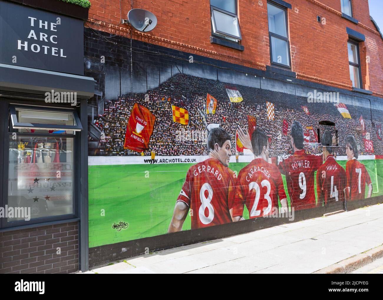Mural of famous Liverpool FC players painted on building wall, Anfield, Liverpool, England, UK Stock Photo