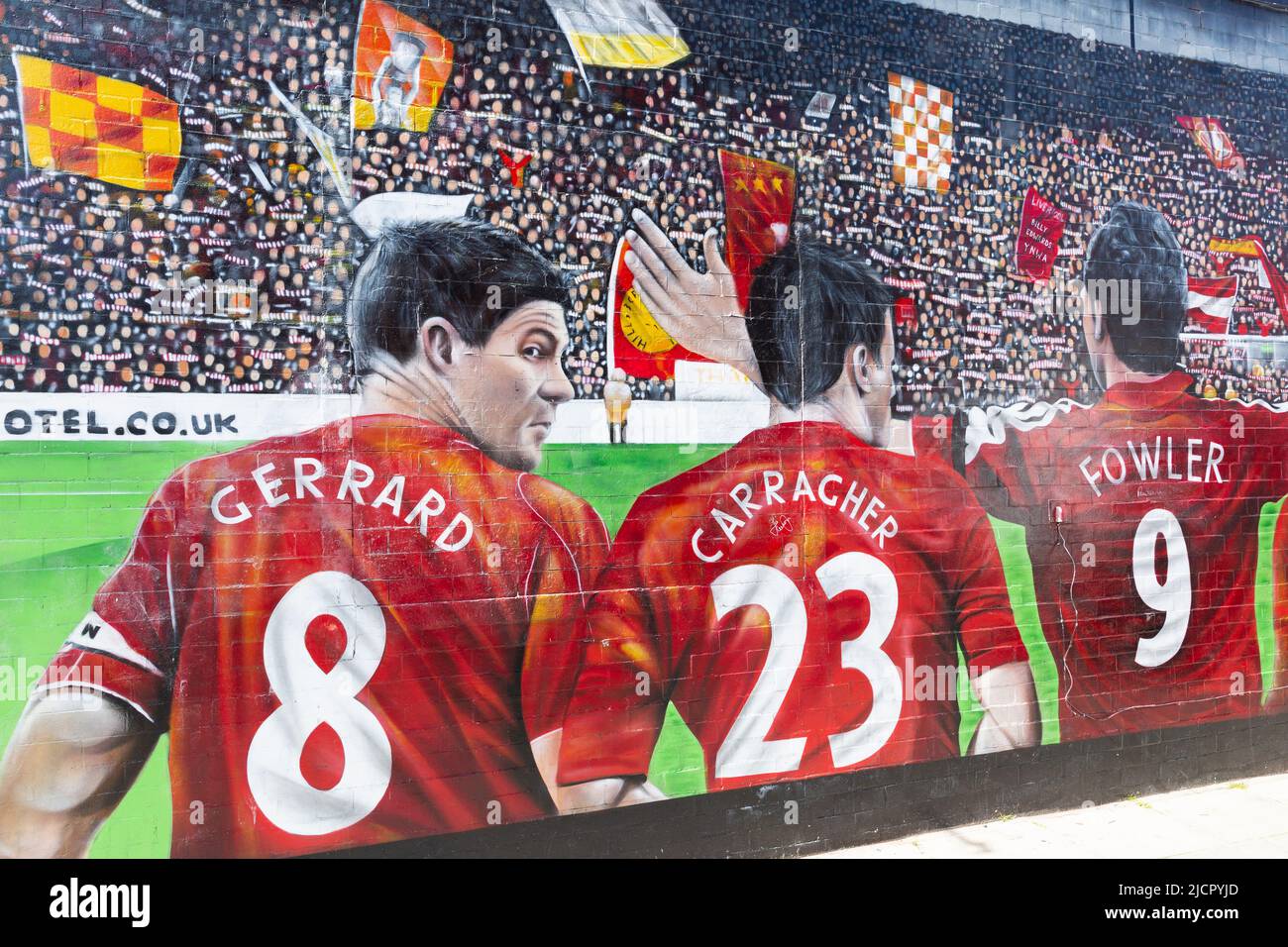 Liverpool FC mural featuring Steven Gerrard, Jamie Carragher and Robbie Fowler, Anfield, Liverpool, England, UK Stock Photo