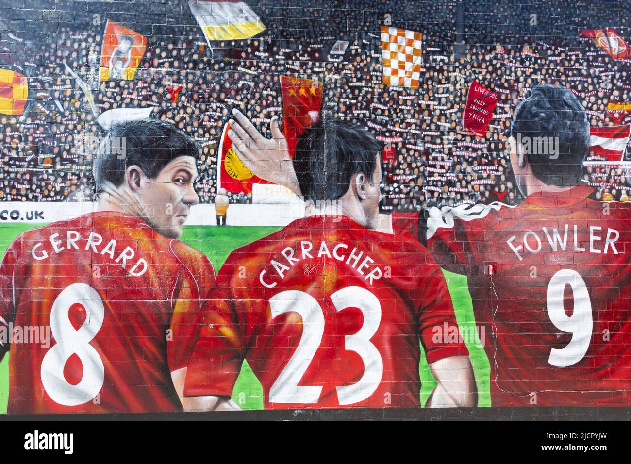 Liverpool FC mural featuring Steven Gerrard, Jamie Carragher and Robbie Fowler, Anfield, Liverpool, England, UK Stock Photo