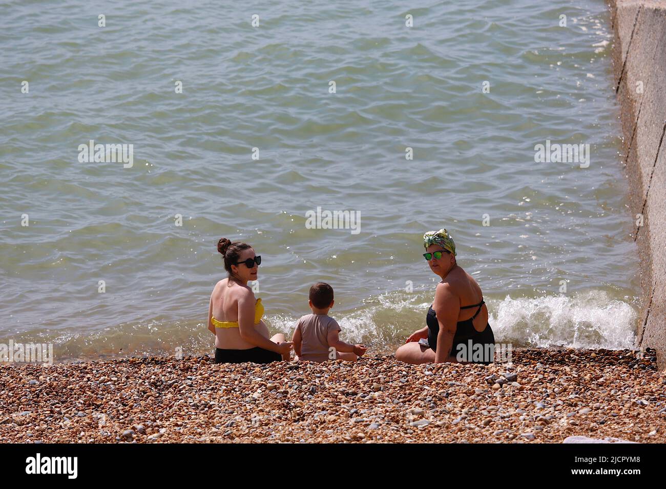 Hastings, East Sussex, UK. 15 Jun, 2022. UK Weather: Hot and sunny at the seaside town of Hastings in East Sussex as Brits enjoy the warm weather today along the seafront promenade. Photo Credit: Paul Lawrenson /Alamy Live News Stock Photo