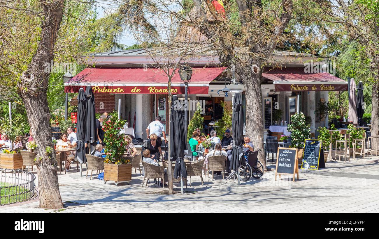 Palacete de Rosales, a small restaurant with a terrace near Parque del Oueste in central Madrid, Spain. Customers are sitting on the terrace. Stock Photo