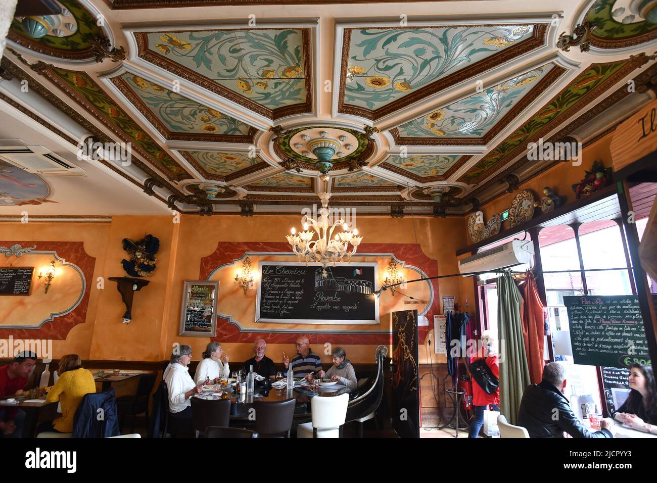 Italian Restaurant with magnificent Art Deco glazed tile ceiling in Bourges, France Stock Photo
