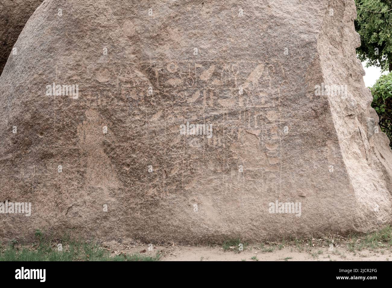 Granite boulders with pharaonic inscriptions, Aswan, Egypt Stock Photo