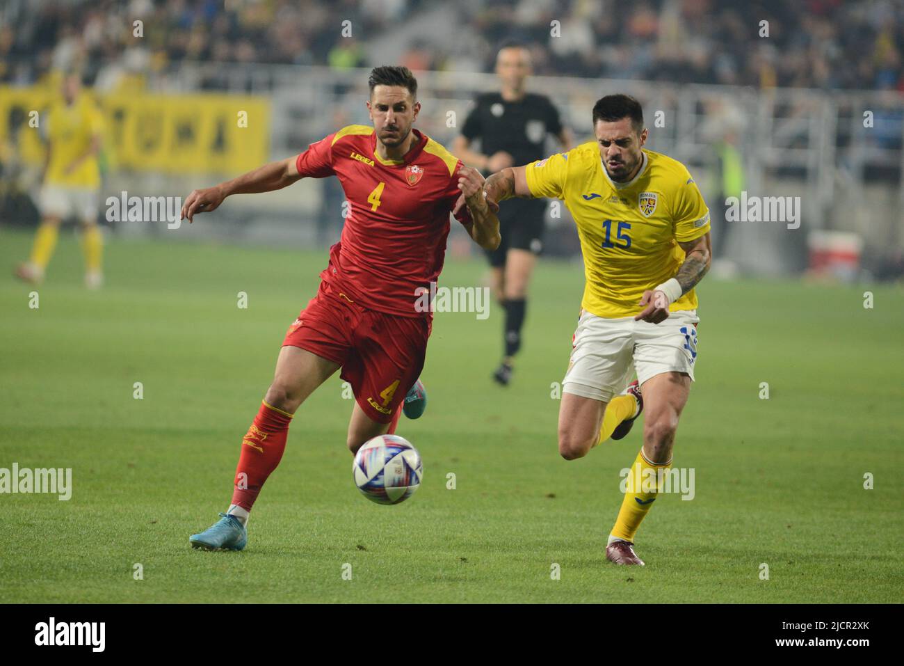 Marko Vukčević #4 and Andrei Burca #15 during UEFA Nations League game between Romania and Montenegro , 14.06.2022, Stadion Giulesti ,Cristi Stavri Stock Photo