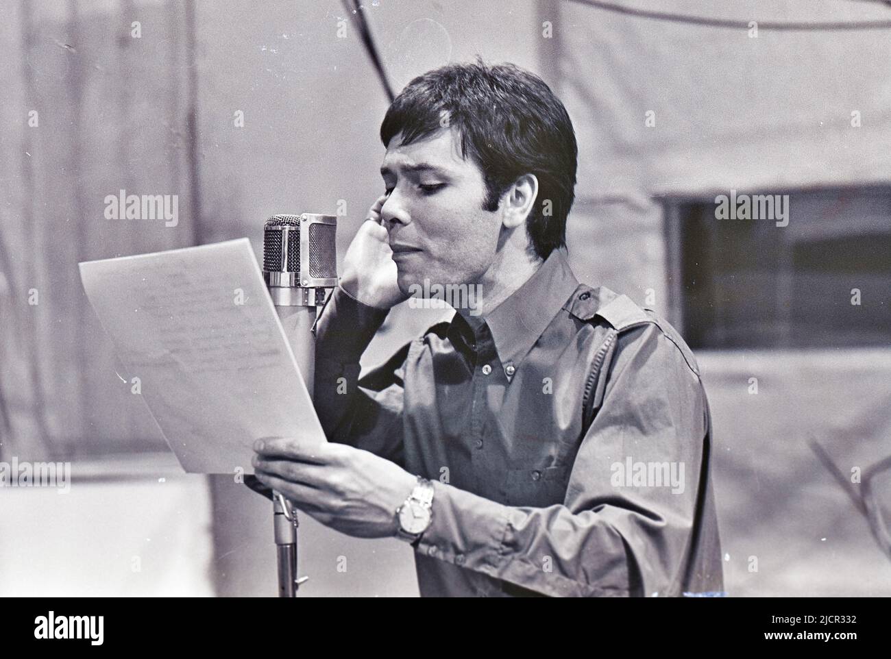 CLIFF RICHARD UK pop singer and film actor recording in May 1966. Photo: Tony Gale Stock Photo