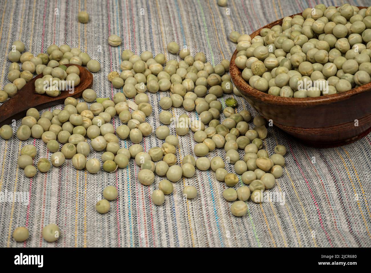Uncooked dried green peas, also known as vatane in Marathi. in a
