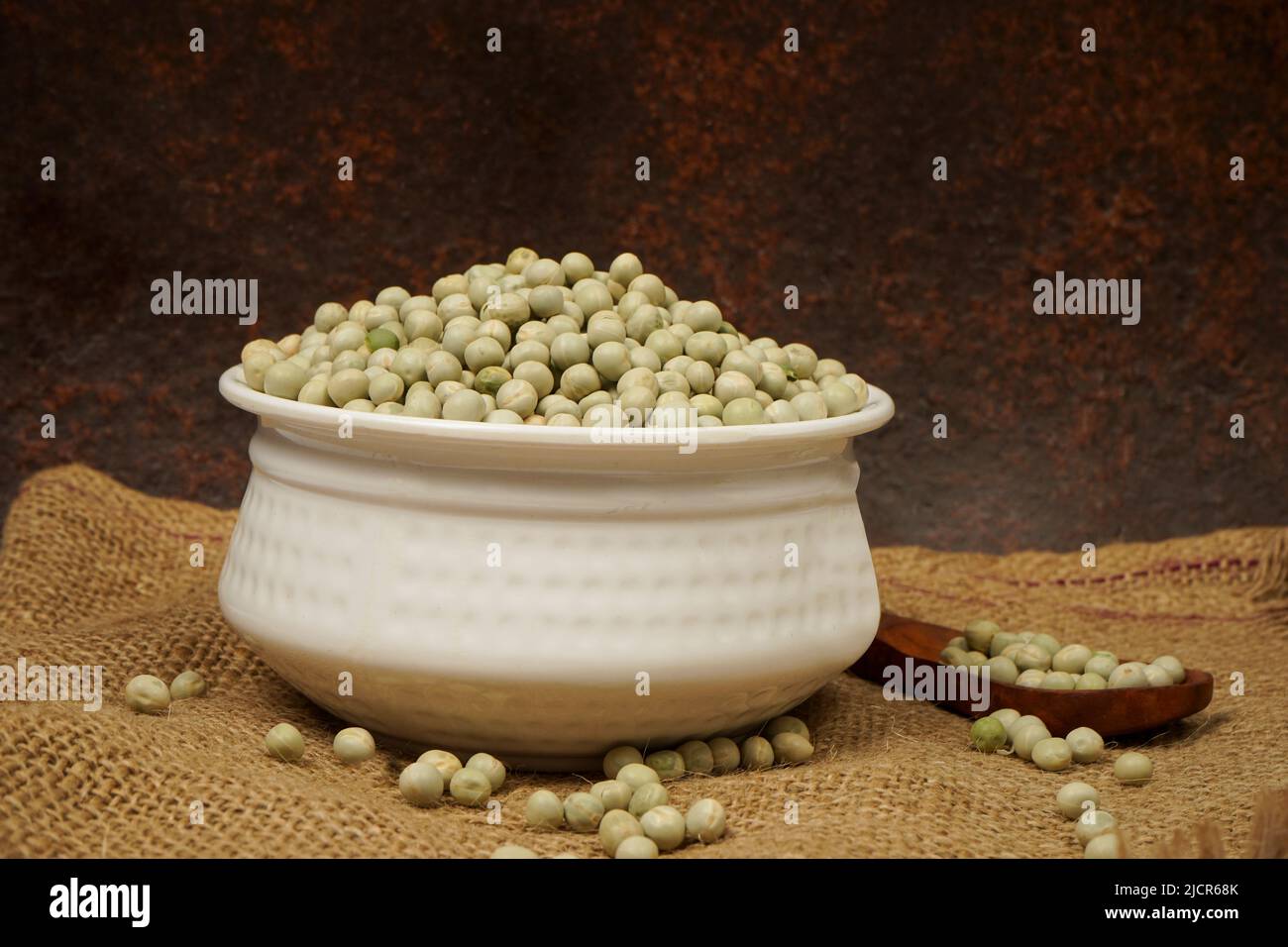 Uncooked dried green peas, also known as vatane in Marathi. in a